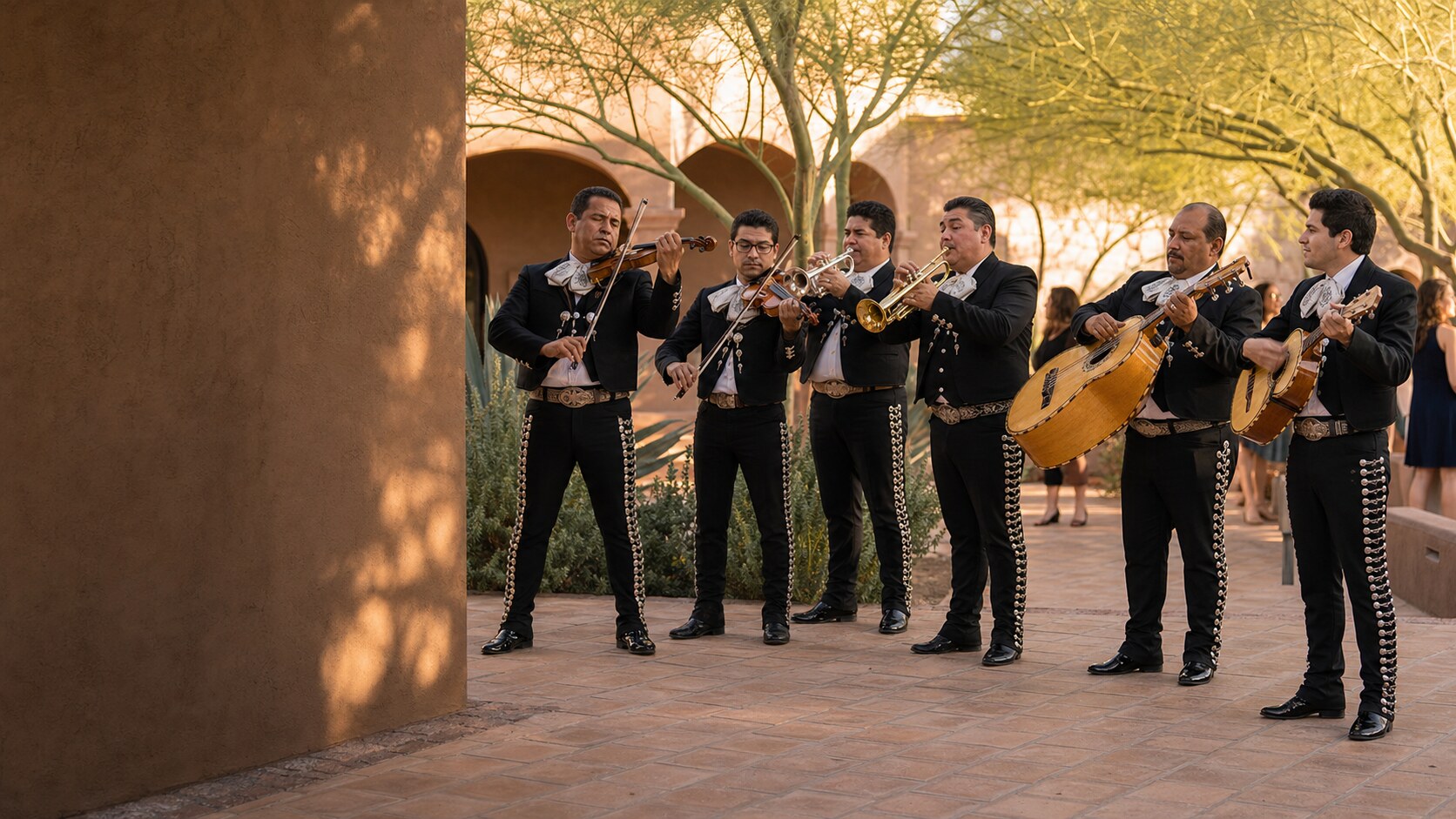 Professional mariachi band in Glendale, Arizona performing at a shaded desert courtyard celebration
